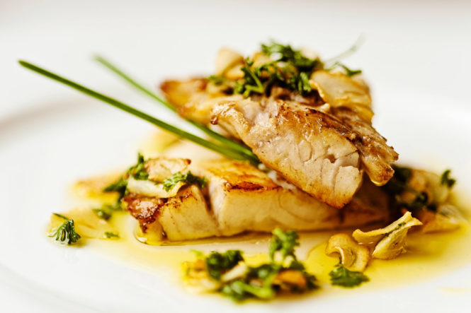 Food picture Fish with parsley sauce in restaurant