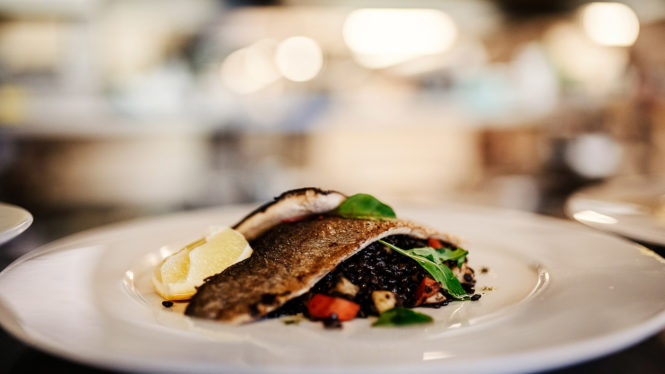 Food picture Fish with lentils in restaurant